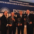 (From left) Michael Fields, Ph.D., dean of the H. Wayne Huizenga School of Business and Entrepreneurship, with the 2010 inductees into the Entrepreneur Hall of Fame: Don Taft, Mitchell Berger and Mike Jackson.