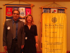 Bahaudin and Shari at Rotary Club - Next to 4 Way Test banner at Weston Club- 8 1 13