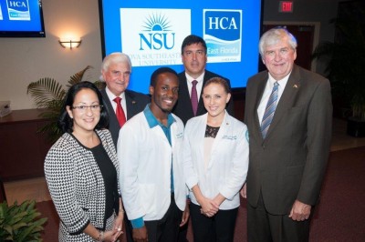 From left to right: Jacqueline Travisano, M.B.A., CPA, NSU executive vice president and COO, George L. Hanbury II, Ph.D., NSU President and CEO, Rolando Norman, NSU 2nd year nursing student and full faculty chair of Nursing Student Association,  Michael G. Joseph, HCA East Florida President and CEO, Zasha Erskine, NSU 2nd year nursing student and president of Nursing Student Association, and Ralph V. Rogers Jr., Ph.D., executive vice president of Academic Affairs.