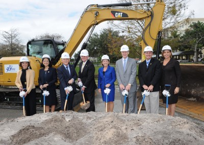 Nova Southeastern University representatives and donors break ground on the $80 million Center for Collaborative Research. Left to right: Nell McMillan Lewis, Ed.D.; Royal Dames of Cancer Research, Inc. and NSU Board of Trustees member; Jacqueline Travisano, M.B.A., C.P.A., NSU executive vice president and chief operating officer; Ron Assaf, NSU Board of Trustees chair; George L. Hanbury II, Ph.D., NSU president; Carol M. Harrison, Royal Dames of Cancer Research, Inc. and NSU Board of Trustees member; George Weaver, Emil Buehler Perpetual Trust; Eric S. Ackerman, Ph.D., dean of NSU’s Graduate School for Computer and Information Sciences; Jennifer O’Flannery Anderson, Ph.D., NSU vice president for advancement and community relations