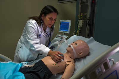 Marianne Jankowski, DHSc., RRT, chair of NSU’s Department of Cardiopulmonary Sciences and director of the Respiratory Therapy Program demonstrates high fidelity pediatric simulation at NSU Palm Beach.