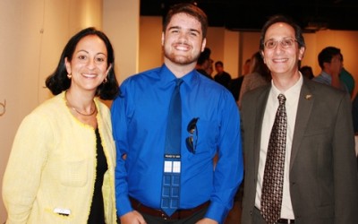 Honors student Josh Whitehurst with Jacqueline Travisano, M.B.A., CPA, and Don Rosenblum, Ph.D., dean of the Farquhar College of Arts and Sciences, at a reception for merit-scholarship recipients on Aug. 26