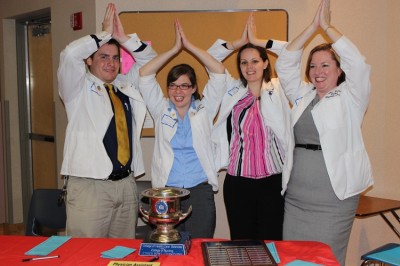 Fins up! 1st year Physician’s Assistant Ft. Meyers students accepting the Ethics Bowl Award with NSU Pride (from left to right): Eric Bertha, Alia Rawlins, Nikki Iozzia and Heather Robbins.