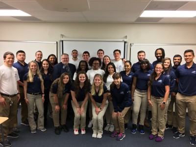 In the first, second, and third rows are all Levels of NSU athletic training students taking a picture with NATA President Scott Sailor (from the left, second row, third person).