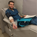 Class President Kevin Luks donating blood
