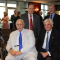 Seated: Ray Ferrero Jr., chancellor of NSU (left); George Hanbury, Ph.D., president of NSU.