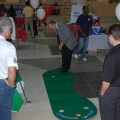 Dean Michael Fields makes a hole-in-one at the Business Minors Fair