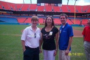 Angela Schukei with Melissa Kuper, Assistant GM for Roger Dean Stadium, and Jeffrey Jackson, scholarship winner for the Jupiter Hammerheads.