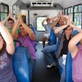 Students and their families show their excitement in becoming an NSU Shark during a campus tour.