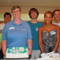 Mary Friel (with cake), new Sharks, and Kathy Corbett, Ed.D. (far right)