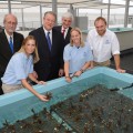 From left to right: Back Row – Richard E. Dodge, Ph.D., Dean of NSU’s Oceanographic Center and executive director of NSU’s National Coral Reef Institute; Former Vice President Al Gore; and NSU President George L. Hanbury II, Ph.D. Front row: NSU Oceanographic Center graduate students giving the vice president a demonstration on how the NSU onshore coral reef nurseries work.