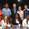 NSU Board of Trustee Kenneth Tate with students