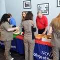 Dean Terry Morrow and Dean Richard Davis serving students at the Dean’s Luncheon in Tampa.