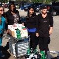 A group of NSU representatives pictured with a CCMI Liaison with the donation of food that was shared with many.