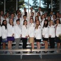 Class of 2016 wearing their white coats
