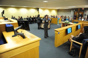 Marlene Rodriguez, an Assistant U.S. Attorney, demonstrates the courtroom’s new technology.
