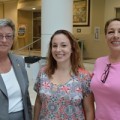 FCAS Associate Dean Robin Sherman, Ph.D. (left),  with a family at the Dual Admission and Honors Program Expo