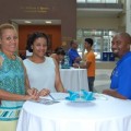 Admissions Recruiter Rashad Howze (right) meets with a family on New Majors Day