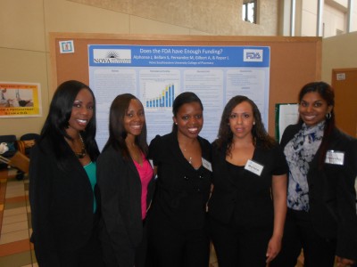 NSU pharmacy students posed in front of their poster which they presented for the Therapeutics and Pathophysiology III Seminar day this past April. Left to right: Anishka Gilbert, Judith Alphonse, Lauren Roper, Marlene Fernandez and Sireesha Bellam