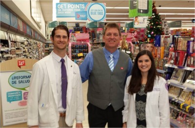 College of Pharmacy students join a Walgreens employee as part of Project Vaccination.