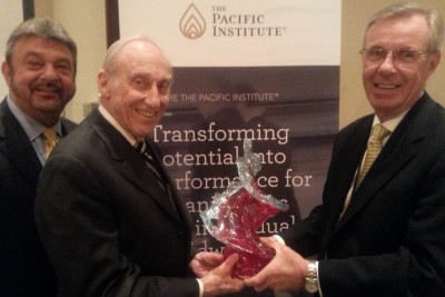 Abraham S. Fischler, Ed.D., (center) was welcomed by Joe Atteridge, Chief Executive of Pacific Institute – U.S. Operations. At left is Joe Pace, Ed.D., Chairman of Global Education initiatives for TPI and a graduate of the Fischler School’s program in educational leadership. 