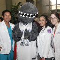NSU's College of Pharmacy students pose with Razor at Career Day.