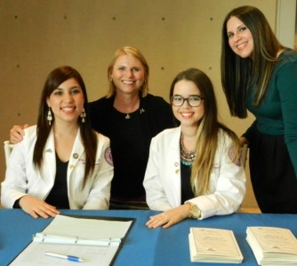 1. Ambassadors Yeiry Pérez ('18) and Crystal Figueroa ('18) with COP Dean Lisa Deziel, Pharm.D.,Ph.D. and COP Assistant Jessica Durán