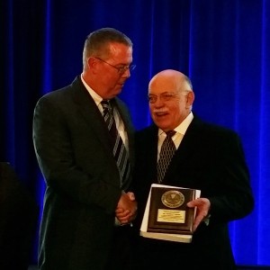 Carl Driscoll, D.M.D., president of the American College of Prosthodontists presents Thomas J. Balshi, D.D.S., with The Dan Gordon Lifetime Achievement Award at the 46th Annual Session of the ACP