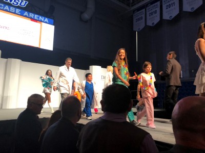 NSU’s H. Thomas Temple, M.D., joins children and professionals on the catwalk to support children’s cancer research