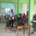 Albert playing guitar