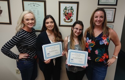 Biology Fund Award Sharkbyte 1.jpg Biology Student Award recipients with their mentoring faculty: From left to right: Halmos Faculty member Katie Crump, Ph.D. Award winners: Elizabeth Horta and Elizabeth Feldman, and Halmos Faculty member Jessica Brown, Ph.D. 